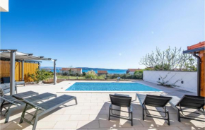 Awesome apartment in Kastel Gomilica with Outdoor swimming pool, WiFi and 2 Bedrooms